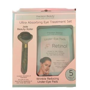 Precision beauty retinol under eye pads with jade beauty roller